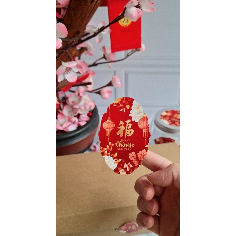 

Stiker toples kado imlek bentuk oval design imlek cny 2025