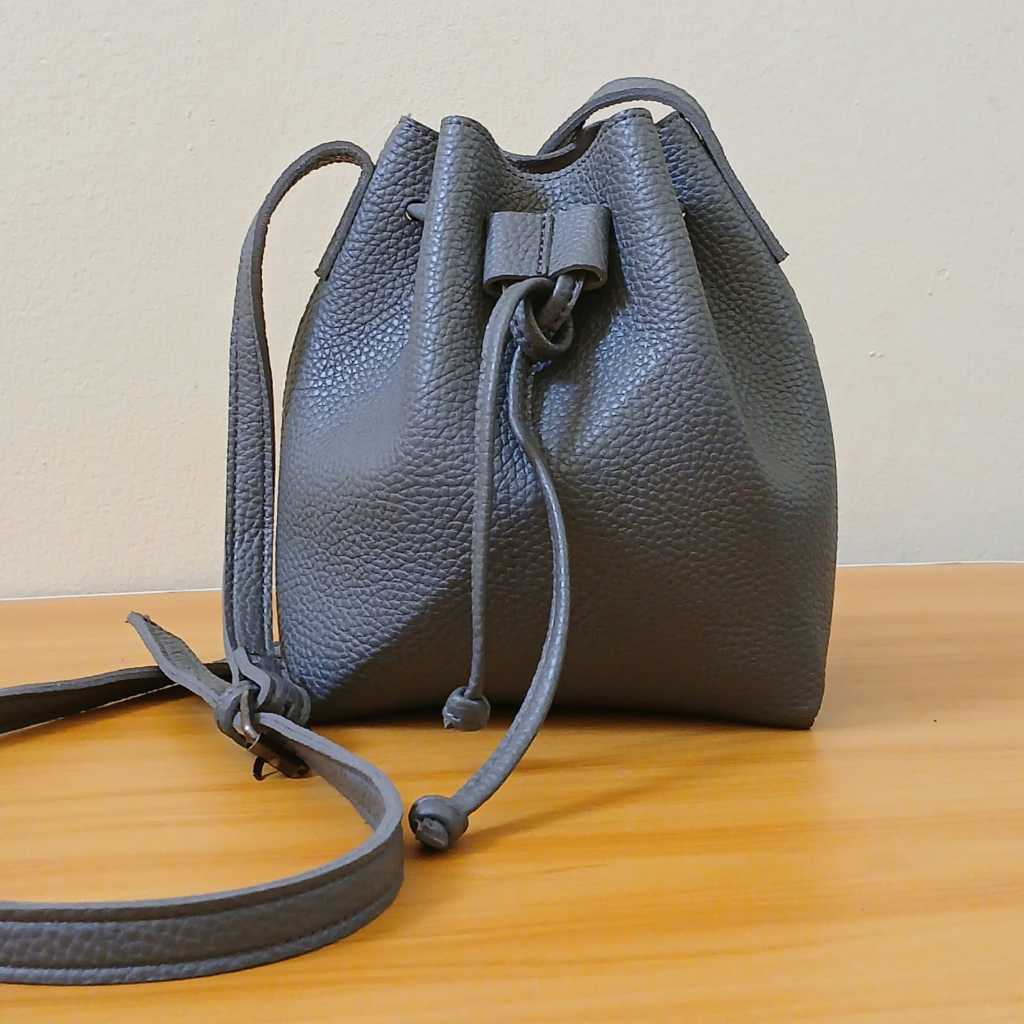 (PRELOVED) TAS SERUT KULIT ASLI CIMIT -  MOTIF KULIT JERUK - SLING BAG MINI SERUT LUCU