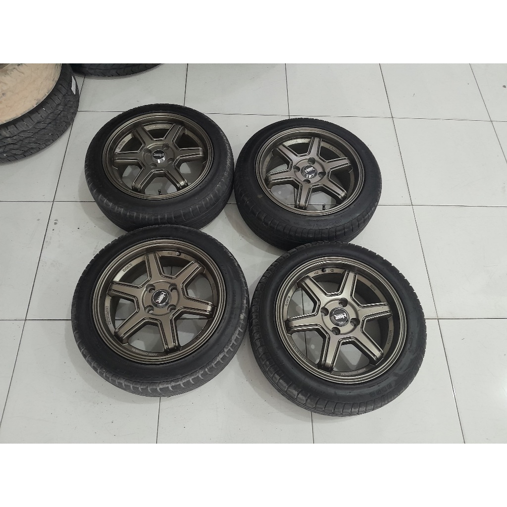 VELG MOBIL BEKAS HAR MINAS R15X6,5 4X100 ET 42+BAN ACCELERA 195 50 R15 VELG UNTUK MOBIL AGYA AYLA SI