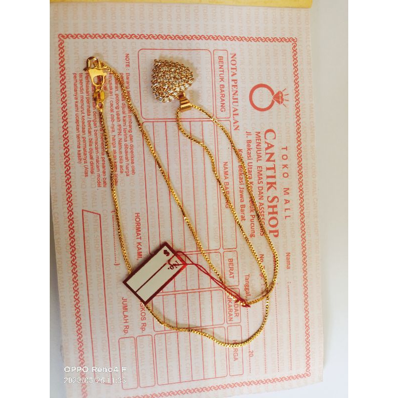 kalung emas muda love kadar 70%berat 8,8 gram ada surat