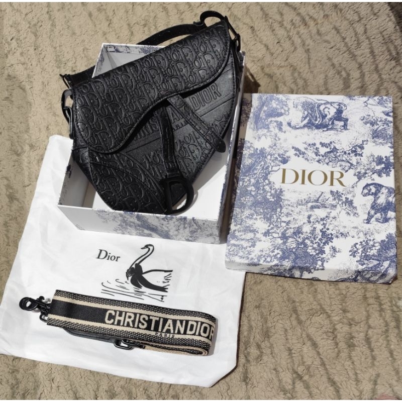 tas dior