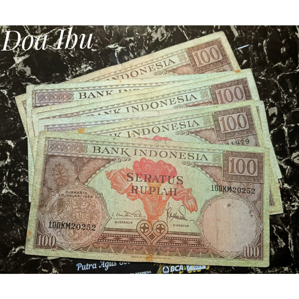 Uang kuno 100 rupiah seri bunga tahun 1959 sesuai foto