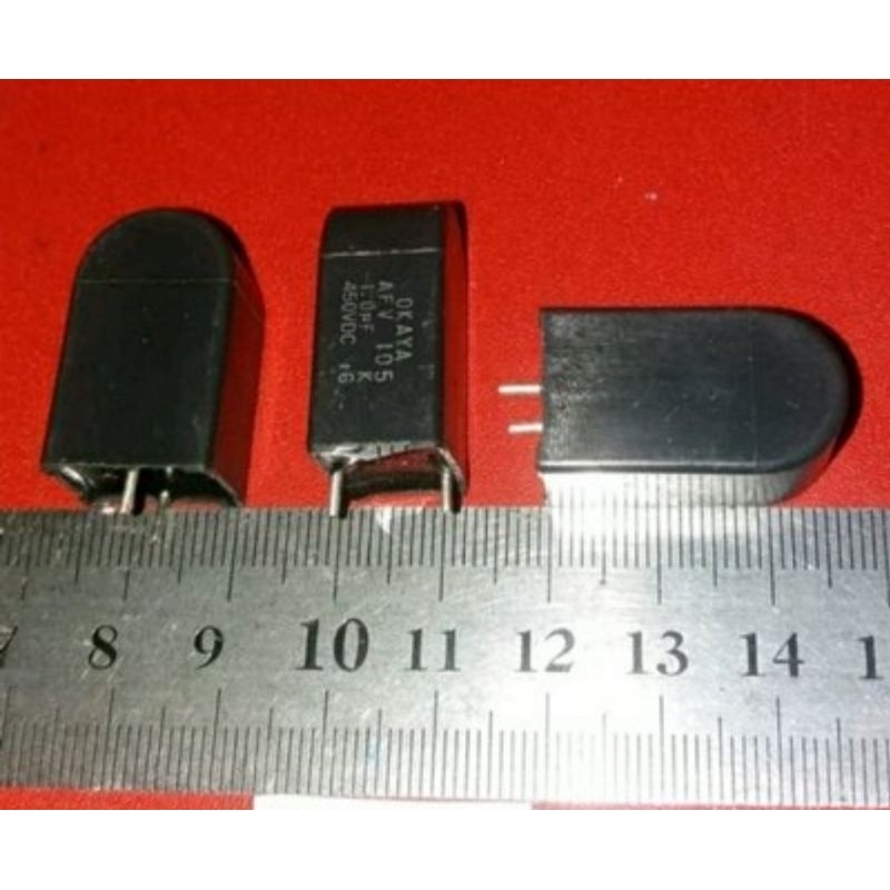 ia26 cap 105 OKAYA 1uf 450v mkm 1.0uf K 450v mkp mpx mkt 1 uf 450 v jarak kaki 10 mm warna HITAM 450