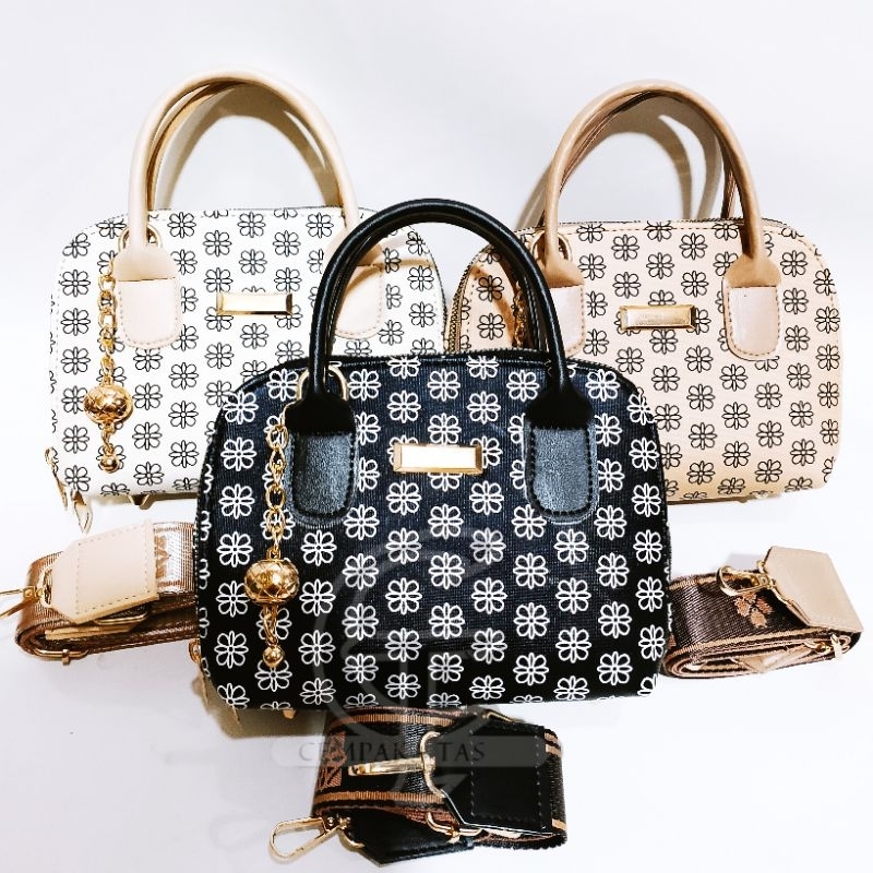 Tas selempang wanita Alma kerang mini motif strala