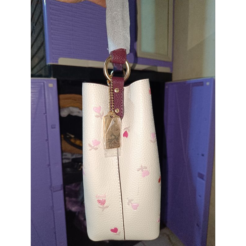 tas coach motif bunga love