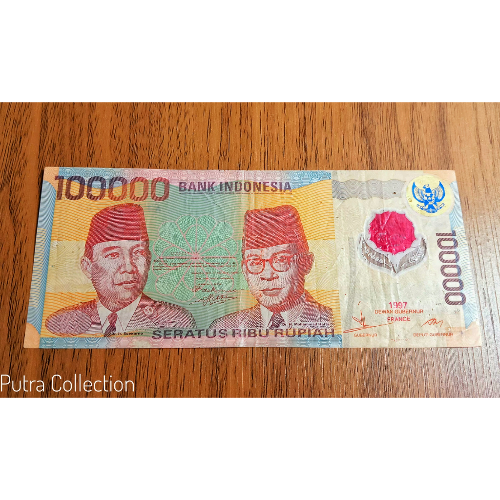 uang 100 polymer Garuda biru tahun 1997 (V14)