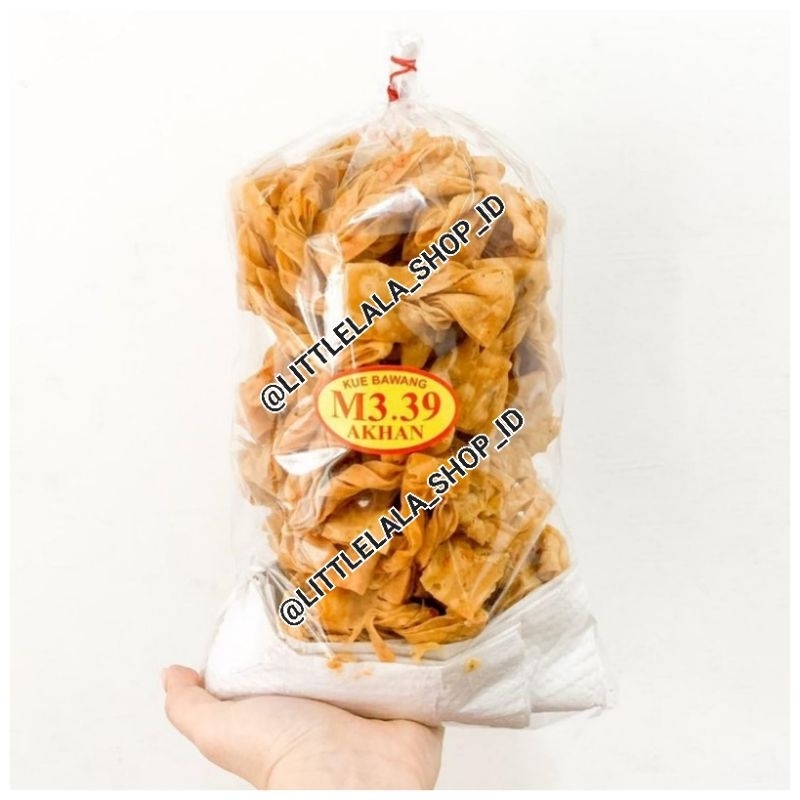

Kue Bawang Pita Akhan Metal Medan isi 500gr renyah dan gurih snack imlek hampers imlek kue bawang legendaris