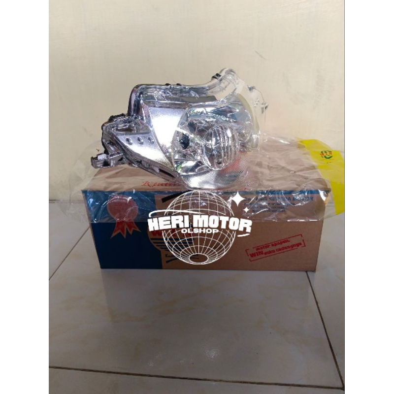 LAMPU REFLEKTOR DEPAN SUPRA X 125 OLD.