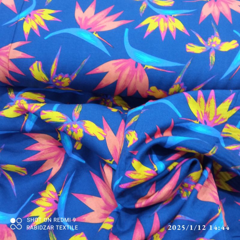 kain katun rayon premium garment motif bungs merah dasar biru