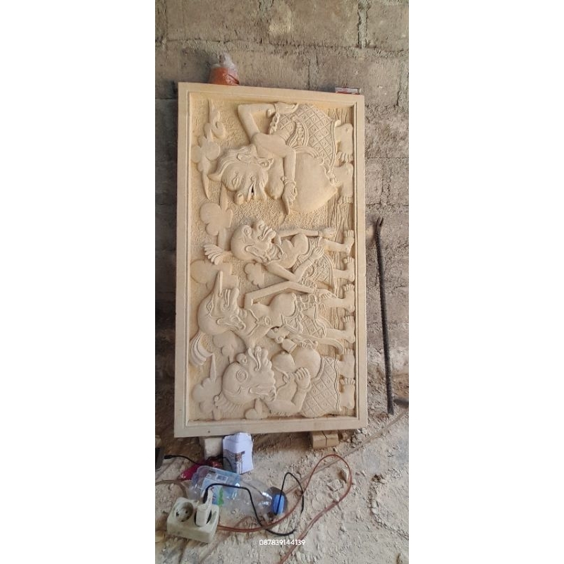 ukiran wayang batu alam motif puno kawan