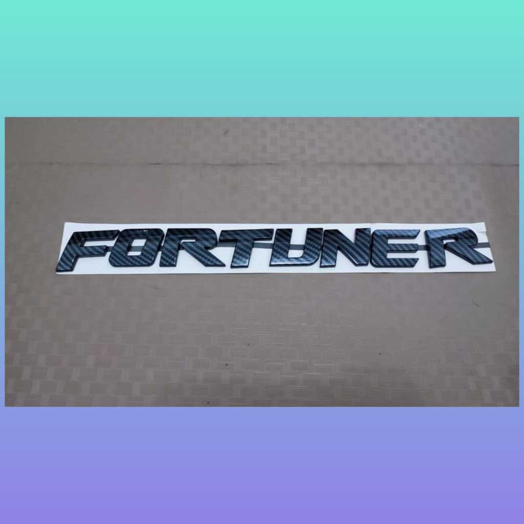 emblem kap mesin tulisan fortuner warna carbon