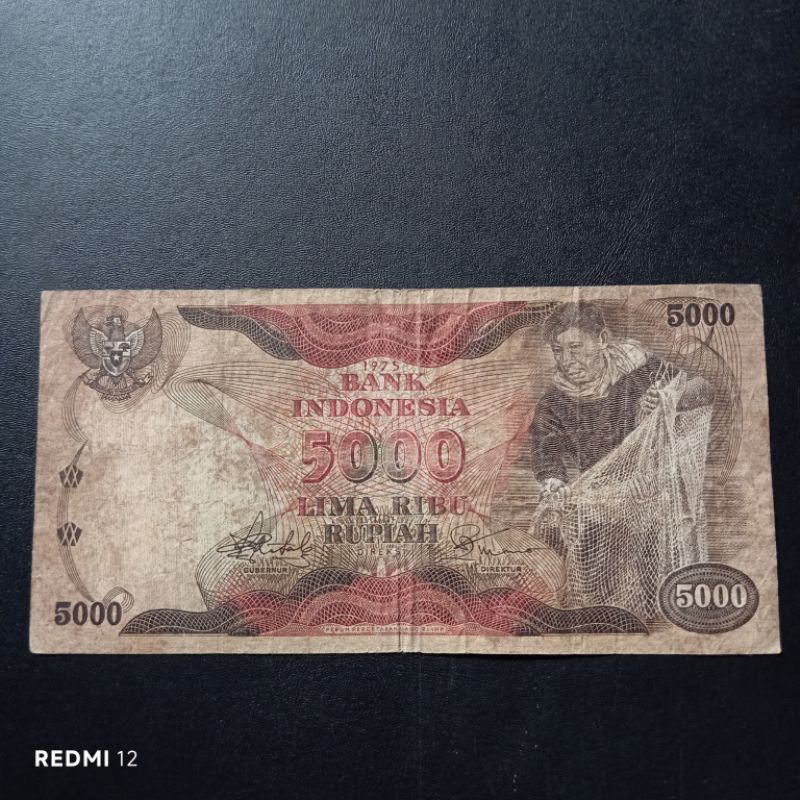 uang kertas kuno 5000 rupiah penjala tahun 1975 bekas asli