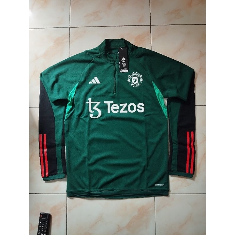 jaket training manchester united tiro 2023