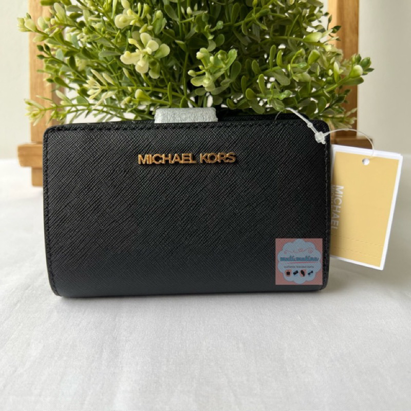 MK Jet Set Travel Medium Bifold Corner Wallet Black Gold Hardware.