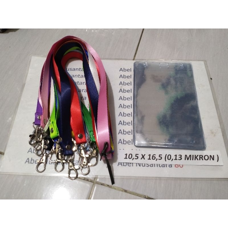 

paket Tali 1, 5 cm polos+plastik panitia uk 10,5 x 16, 5 cm isi paket 10 pcs tebal plastik 0, 13 mikron