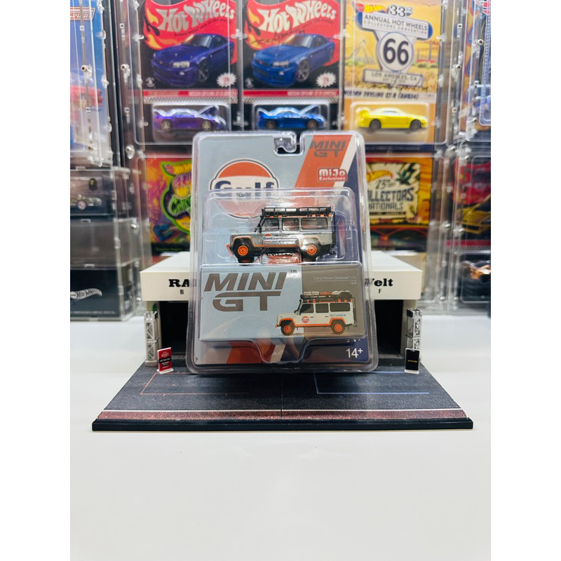 Mini GT CHASE No 156 Land Rover Defender 110 Gulf Mijo Exclusive