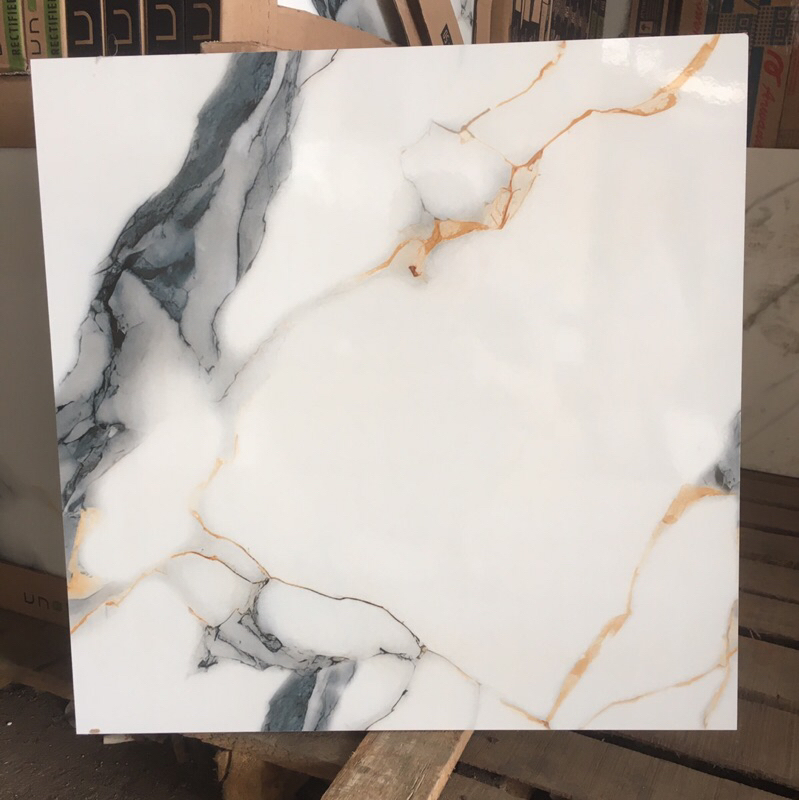 keramik 50x50 lantai dinding motif marmer carara gold grey abu putih emas kilap glossy kualitas glos