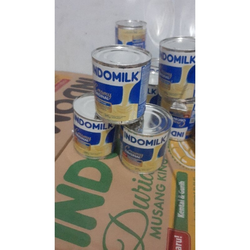 

indomilk kaleng putih