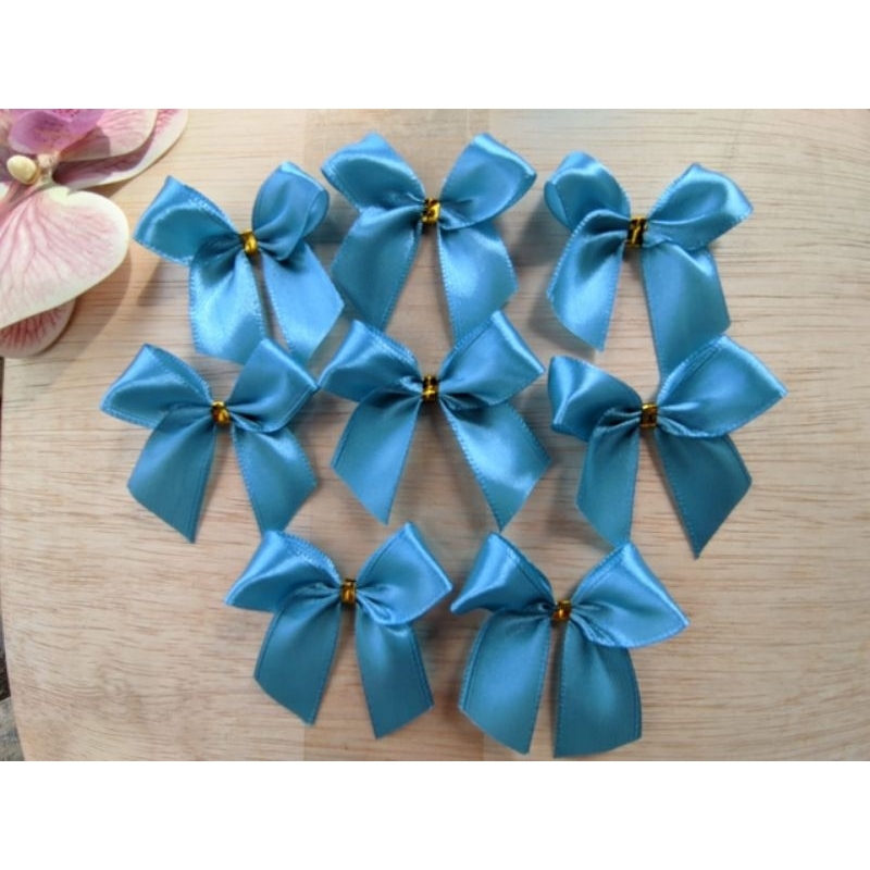 

Pita souvenir instan (isi 100 pcs) | Pita lebar 2 cm | Pita hantaran | Pita hampers | Pita souvenir | Pita souvenir jadi