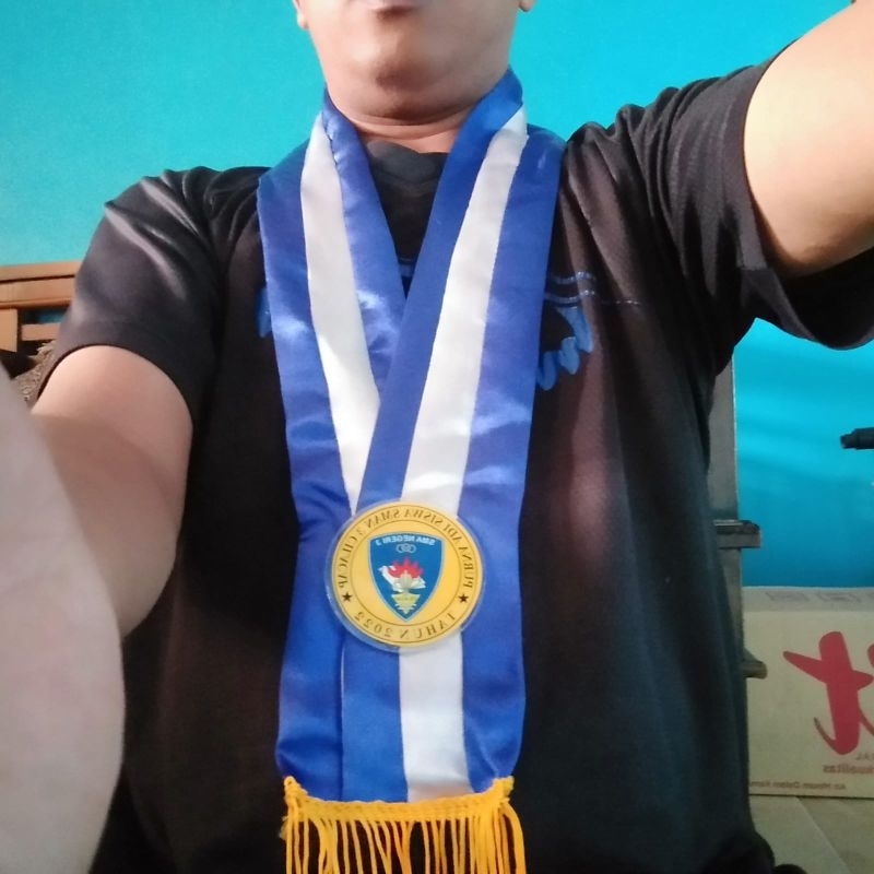 

medali/samirwisuda