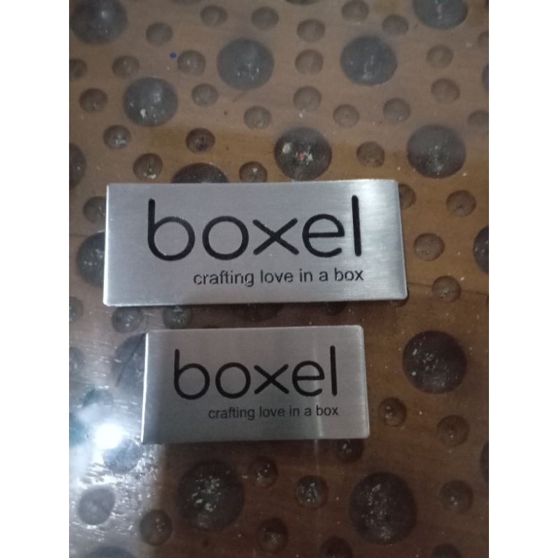 label plat hijab besi