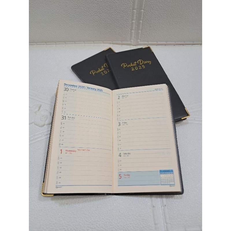 

AGENDA POCKET DIARY KERTAS CREAM TAHUN 2025