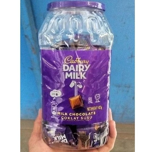 

COKELAT CADBURY DAIRY MILK ORIGINAL NEAPS JAR TOPLES 405gr 90Pcs