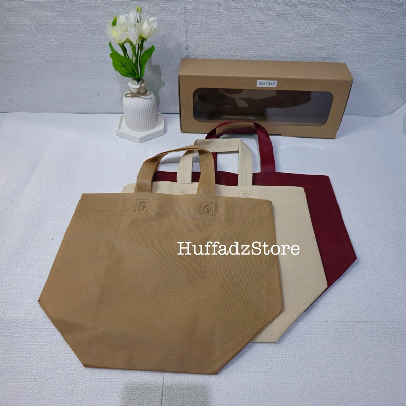 

Goodiebag brownies 32 x 16 x 20 Spunbond isi 12 Pcs