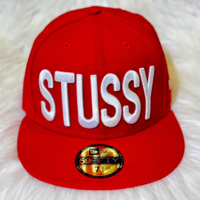 Topi New Era X Stussy Merah