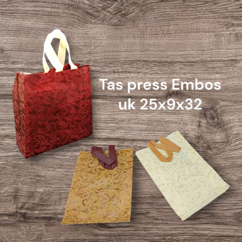 

Tas press Embos uk 25x9x32 (isi 12pcs).