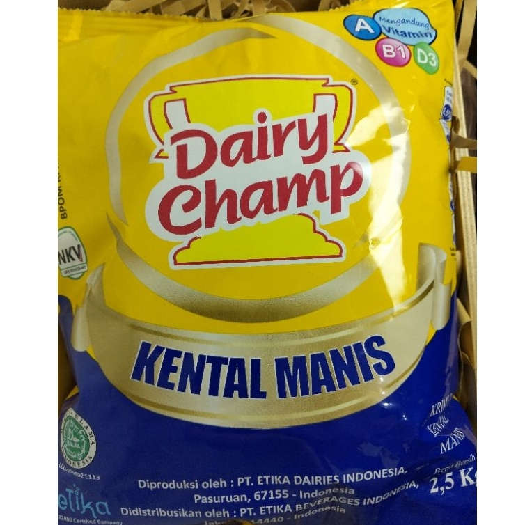 

Susu Krimer Kental Manis Dairy Champ Bantal 2,5kg SKM Dairy Champ 2,5kg