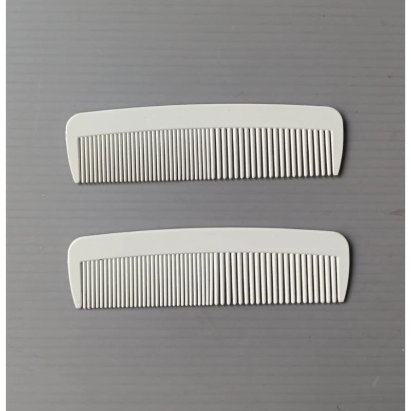sisir saku cowok putih