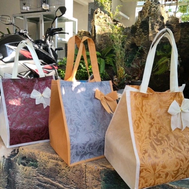 

tas hajatan embos elegan 22 per lusin isi 12 psc