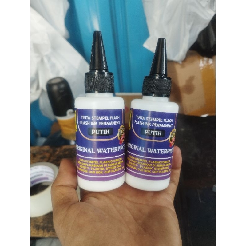 

tinta permanen stempel flash / otomatis, media plastik warna putih ( 100mili )