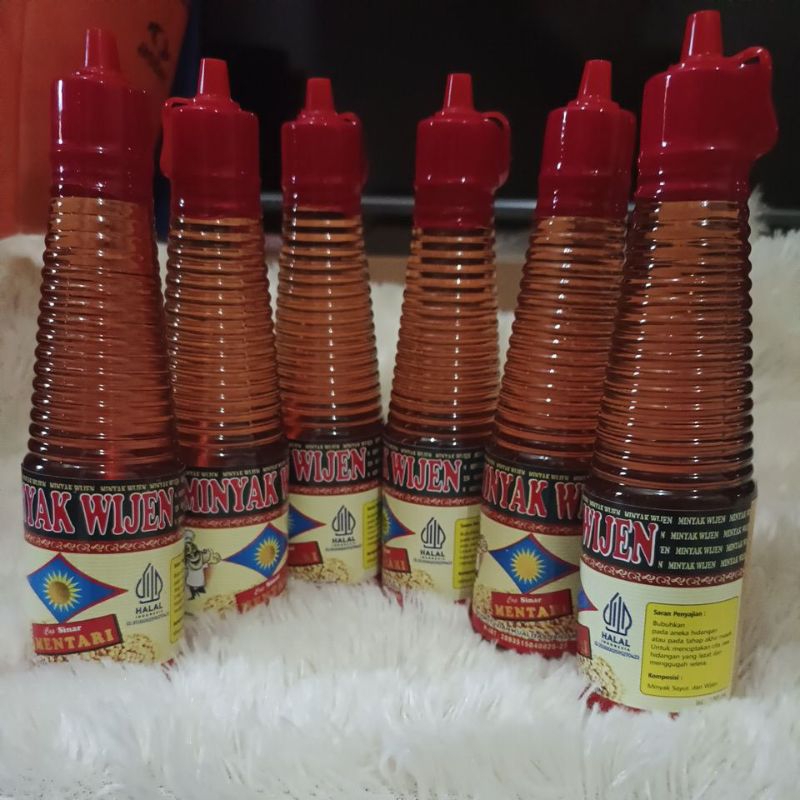 

minyak wijen isi 6 botol @150ml cap sinar mentari