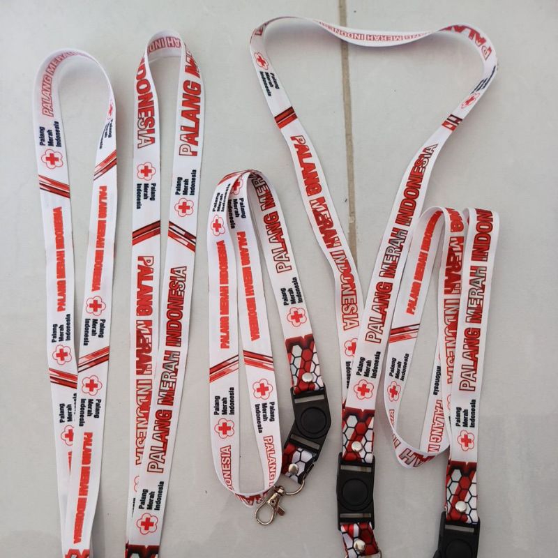 

TALI LANYARD ID CARD 2 CM 2 SISI PMI DESAIN 42