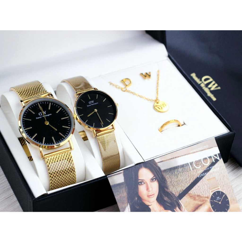 (PAKET JAM SEPASANG +KALUNG+ANTING+CINCIN+PIAPERBAG)jam Daniel Wellington D 4,3 cm?D 3,2 cm