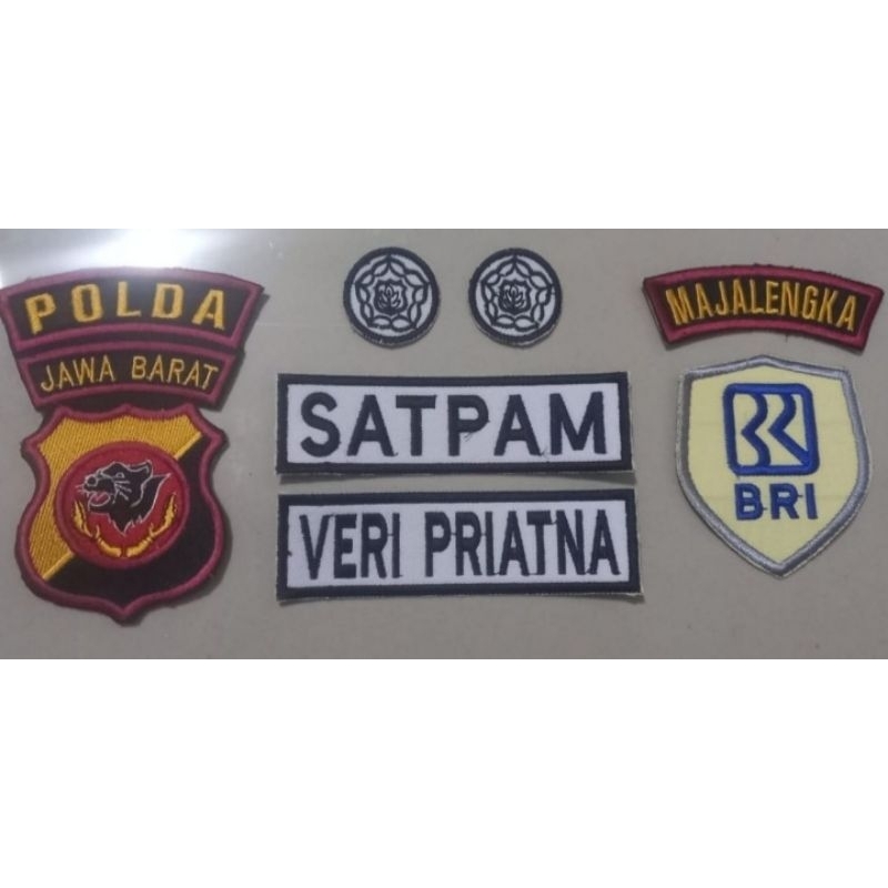 Emblem seragam satpam BRI non timbul