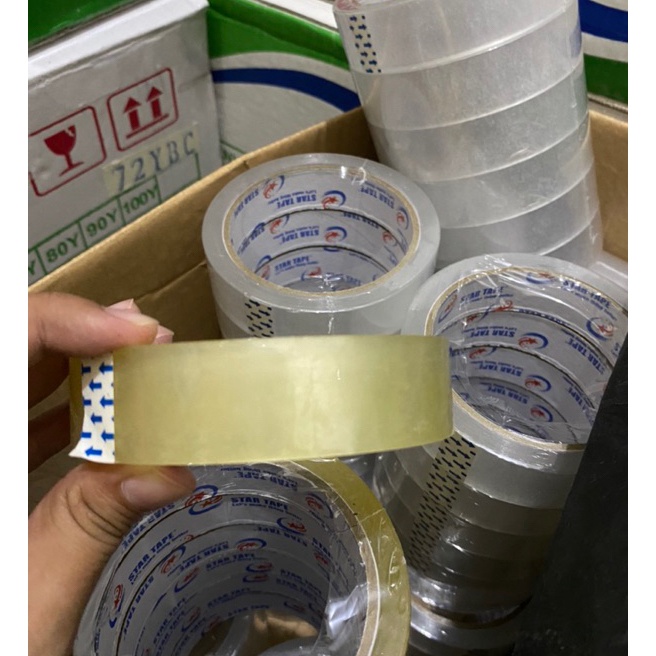 

berkualitas LAKBAN OPP per 1 dus CLEAR BENING KUNING 24MM STAR TAPE HHHH