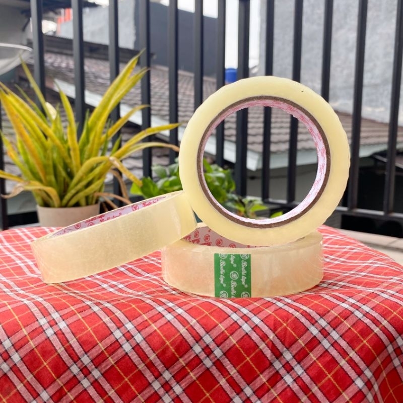 

Isolasi Lakban Bening 45Mic OPP Tape 24x100 Yard 24x90 Yard 24x72 Yard Bodhi Tape 1 Inch Premium Murah - Solatip Packing High Quality