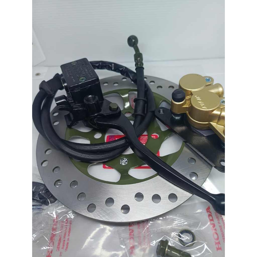 CAKRAM SET ASSY DEPAN KALIPER PALA BABI SUPRA X 125 , SUPRA FIT NEW, KHARISMA ORIGINAL NISSIN