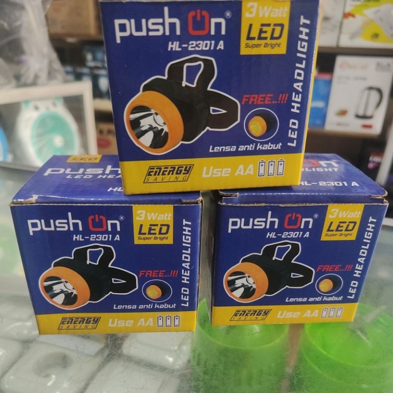 Senter kepala push on LED dengan baterai AAA