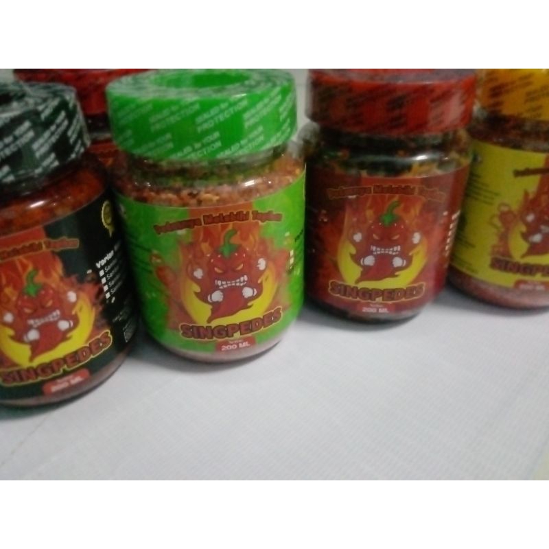 

Sambal terasi merk "SINGPEDES "kemasan toples 200ml,halal,pedas,gurih