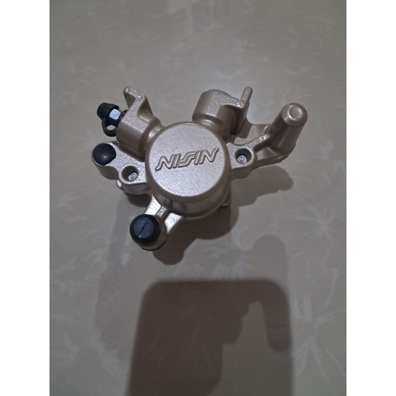 kaliper belakang supra150 original