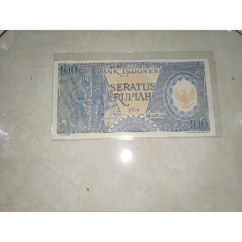 uang 100 / seratus rupiah pekerja biru tahun 1964 asli unc
