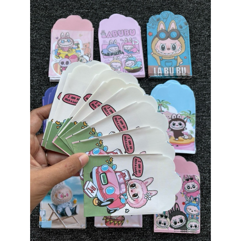 

PAKET 10pak isi 100pcs AMPLOP LEBARAN LABUBU SANRIO MOTIF SESUAI FOTO 10 motif