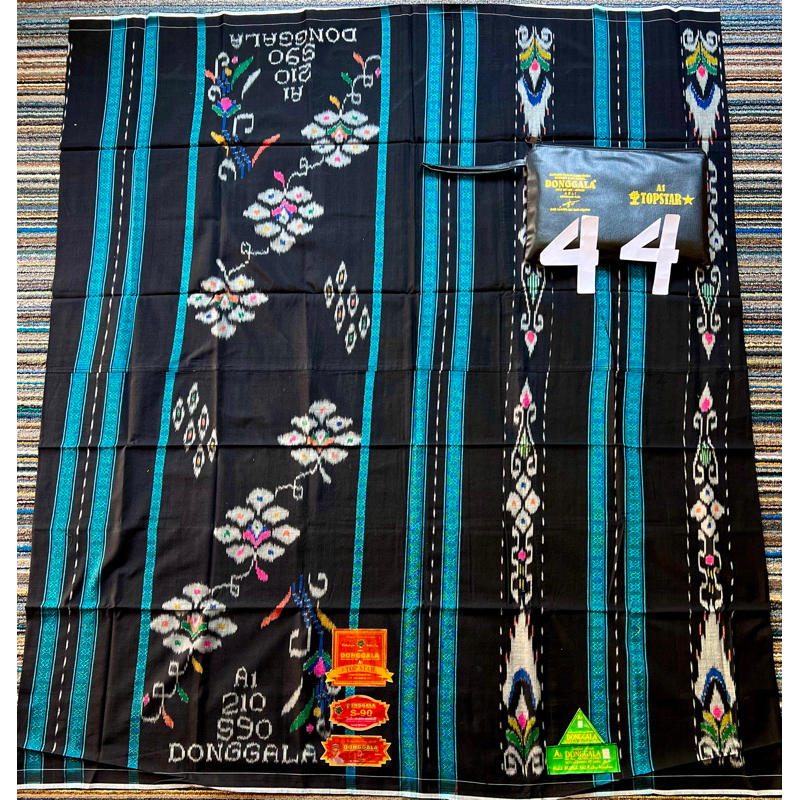 PROMO‼️SARUNG DONGGALA A1 210, S.90 dgn JAHIT TENGAH (ATBM) BAHAN MESREZ LENGKAP TAS Exclusifnya
