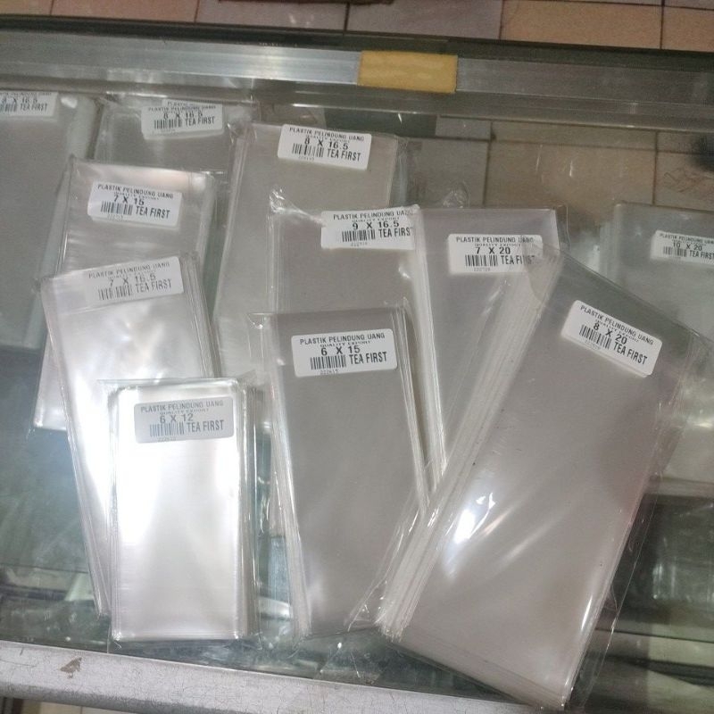 

PLASTIK OPP PELINDUNG UANG KERTAS 7X15 UANG KUNO 100 LEMBAR