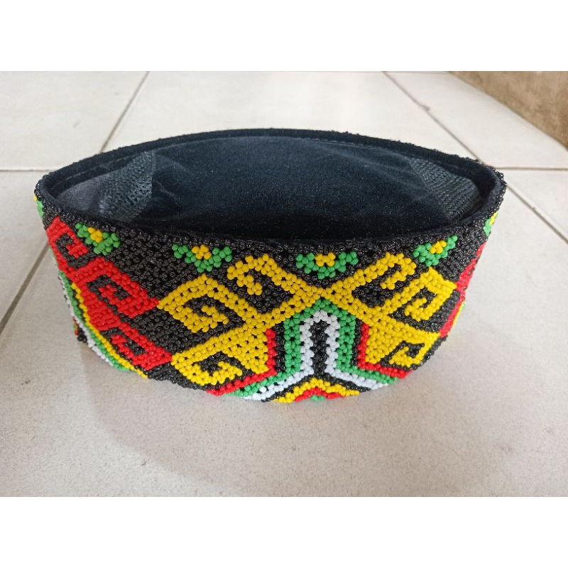 peci manik dayak Kalimantan
