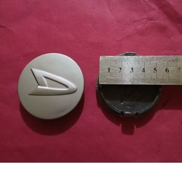 dop roda tutup velg grand mand xenia rhus  2005-2011 diameter 5,5 cm harga satuan 1pis